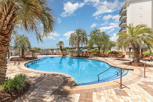 8121 Amalfi Pl Unit 4-801, Myrtle Beach, SC 29572 - community pool featuring a patio area