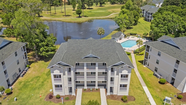 bird's eye view with a water view and view of golf course