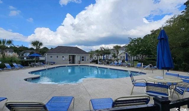 109 Old Town Way Unit 4, Myrtle Beach, SC 29588 - community pool with fence, a patio area, and a residential view