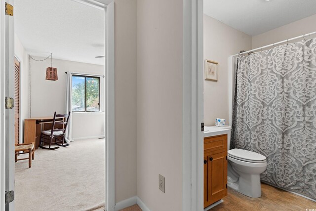 607A 28th Ave S, North Myrtle Beach, SC 29582 - full bathroom featuring toilet, vanity, and a shower with shower curtain