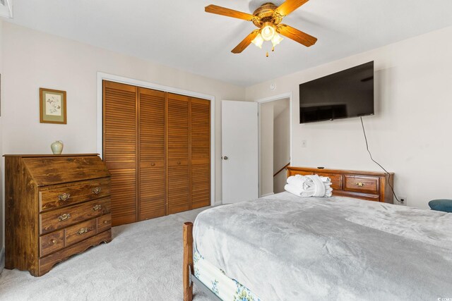 607A 28th Ave S, North Myrtle Beach, SC 29582 - bedroom featuring carpet, a closet, and a ceiling fan