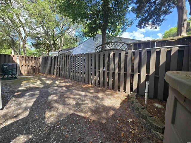 607A 28th Ave S, North Myrtle Beach, SC 29582 - view of yard with a gate