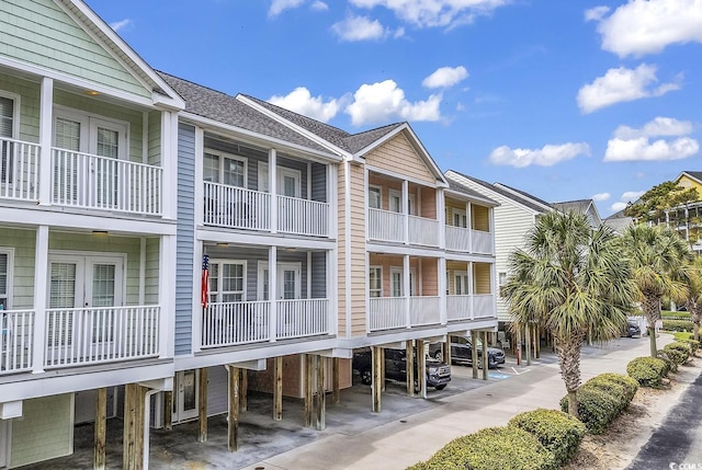 209 Hillside Dr N Unit 104, North Myrtle Beach, SC 29582 - view of property with covered parking