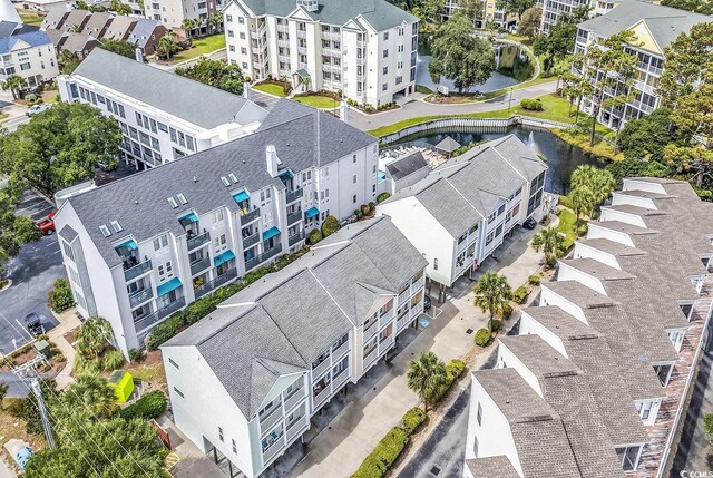 209 Hillside Dr N Unit 104, North Myrtle Beach, SC 29582 - drone / aerial view of a large body of water and apartment complex / building
