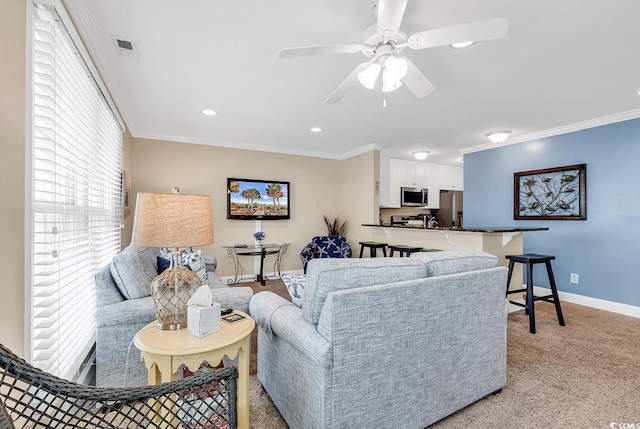 209 Hillside Dr N Unit 104, North Myrtle Beach, SC 29582 - living room with crown molding, baseboards, light carpet, ceiling fan, and recessed lighting