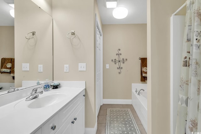209 Hillside Dr N Unit 104, North Myrtle Beach, SC 29582 - full bath featuring vanity, tile patterned flooring, a bath, and baseboards
