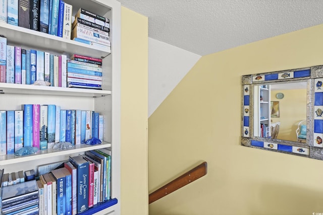 interior details featuring a textured ceiling