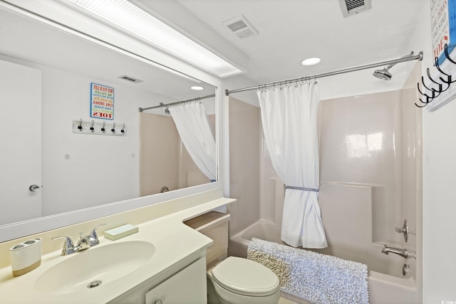 bathroom featuring vanity, shower / tub combo with curtain, toilet, recessed lighting, and visible vents