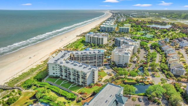 bird's eye view featuring a beach view and a water view