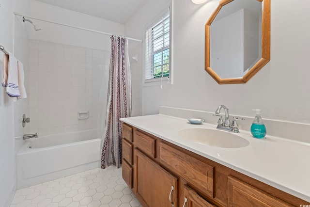 full bath featuring shower / tub combo with curtain, tile patterned floors, and vanity