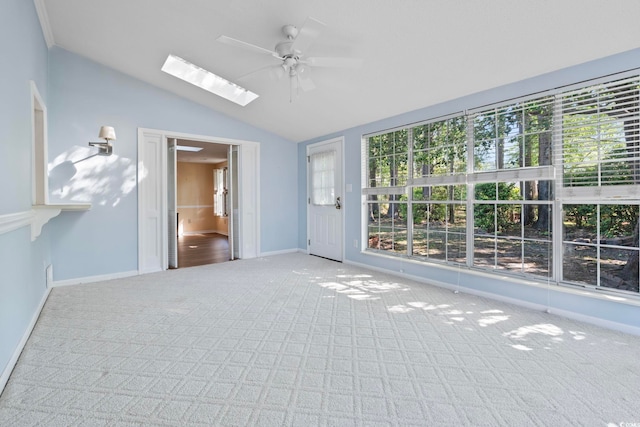 88 Purple Martin Dr, Murrells Inlet, SC 29576 - empty room featuring carpet floors, ceiling fan, a skylight, lofted ceiling, and baseboards