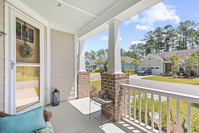 1048 Longwood Bluffs Cir, Murrells Inlet, SC 29576 - view of patio / terrace with covered porch and a residential view