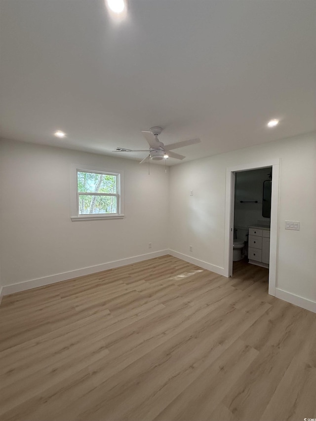 unfurnished room with light wood-style floors, baseboards, a ceiling fan, and recessed lighting