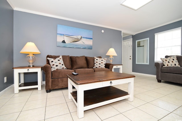 living area with light tile patterned floors, baseboards, and ornamental molding