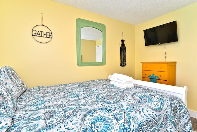 bedroom featuring a textured ceiling