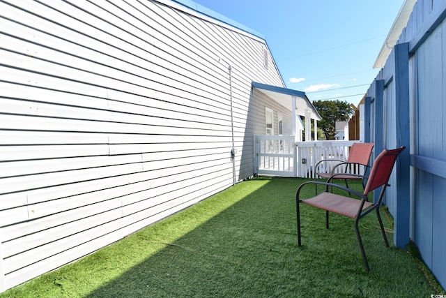 view of property exterior featuring a lawn
