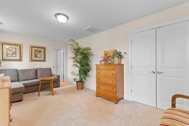 2089 Suncrest Dr, Myrtle Beach, SC 29577 - living room featuring light colored carpet, baseboards, and visible vents