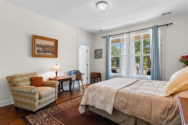 2089 Suncrest Dr, Myrtle Beach, SC 29577 - bedroom featuring baseboards, wood finished floors, and visible vents