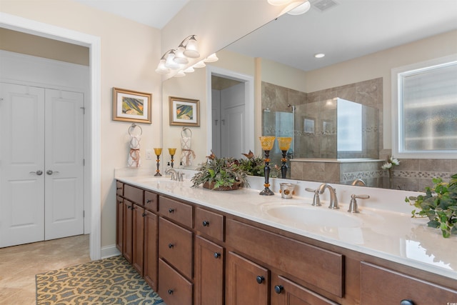 2089 Suncrest Dr, Myrtle Beach, SC 29577 - bathroom with double vanity, a sink, walk in shower, and visible vents