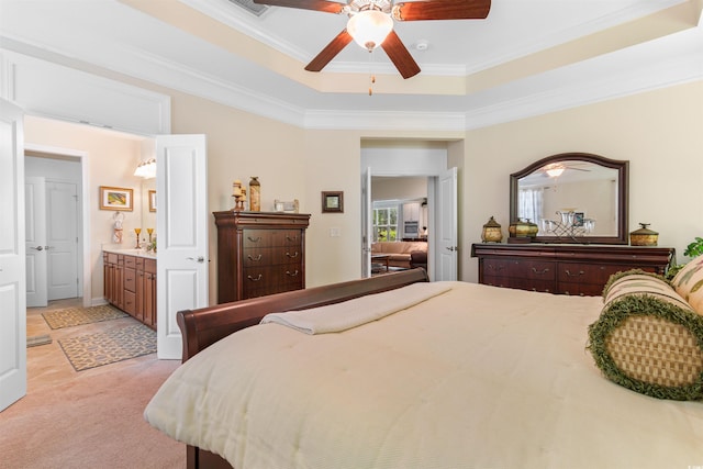 2089 Suncrest Dr, Myrtle Beach, SC 29577 - bedroom with crown molding, light colored carpet, a raised ceiling, a ceiling fan, and ensuite bath