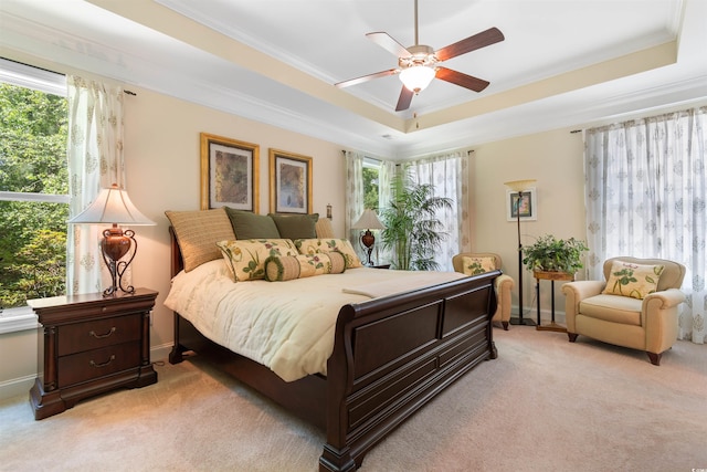 2089 Suncrest Dr, Myrtle Beach, SC 29577 - bedroom with a tray ceiling, light colored carpet, and multiple windows