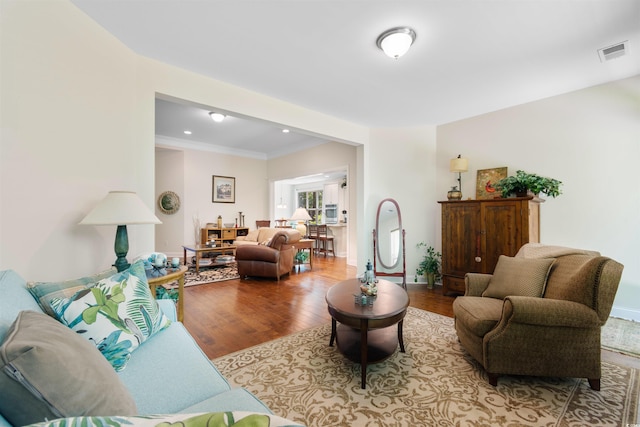2089 Suncrest Dr, Myrtle Beach, SC 29577 - living room featuring visible vents, crown molding, wood finished floors, baseboards, and recessed lighting