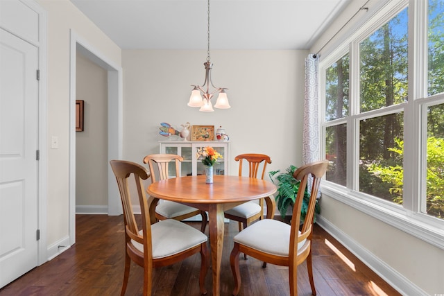 2089 Suncrest Dr, Myrtle Beach, SC 29577 - dining room featuring an inviting chandelier, baseboards, and dark wood-type flooring
