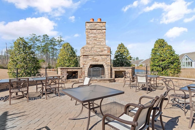 2089 Suncrest Dr, Myrtle Beach, SC 29577 - view of patio featuring an outdoor stone fireplace