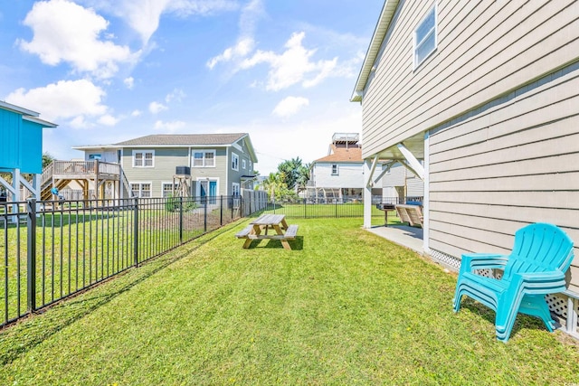 view of yard featuring a residential view and fence