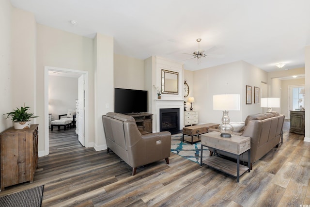 179 Hyacinth Loop, Murrells Inlet, SC 29576 - living area with a fireplace, ceiling fan, baseboards, and wood finished floors