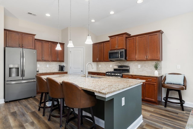179 Hyacinth Loop, Murrells Inlet, SC 29576 - kitchen with dark wood-style flooring, visible vents, a sink, backsplash, and appliances with stainless steel finishes