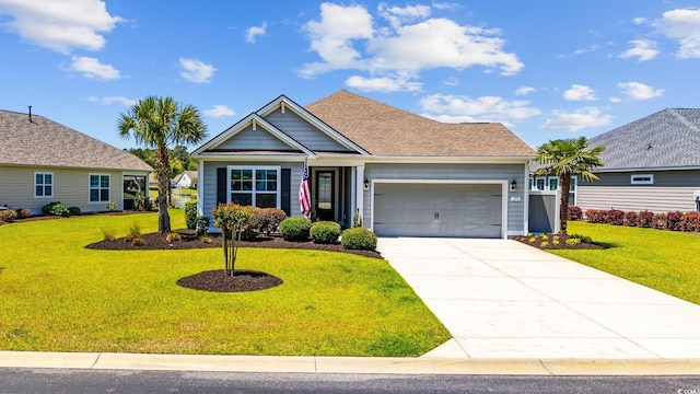 179 Hyacinth Loop, Murrells Inlet, SC 29576 - view of front of property with a front lawn, driveway, and an attached garage