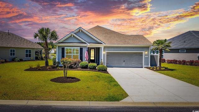 179 Hyacinth Loop, Murrells Inlet, SC 29576 - view of front of property with concrete driveway, a garage, and a front yard