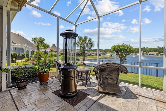 179 Hyacinth Loop, Murrells Inlet, SC 29576 - view of patio featuring a lanai, a water view, and fence