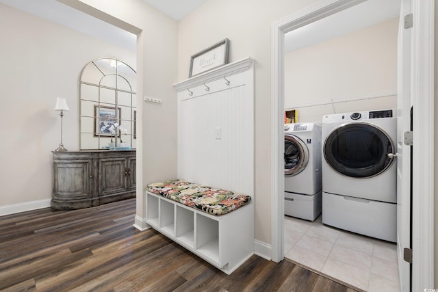 179 Hyacinth Loop, Murrells Inlet, SC 29576 - washroom featuring laundry area, independent washer and dryer, wood finished floors, and baseboards