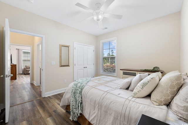 179 Hyacinth Loop, Murrells Inlet, SC 29576 - bedroom with wood finished floors, a ceiling fan, a closet, visible vents, and baseboards