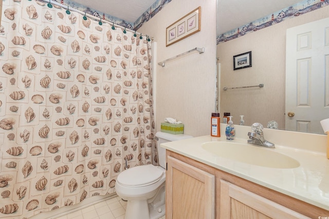 bathroom with vanity, toilet, a shower with curtain, and tile patterned flooring