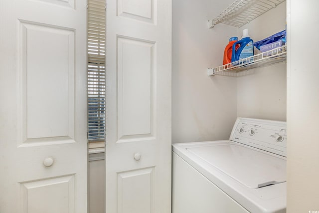 washroom featuring washer / clothes dryer
