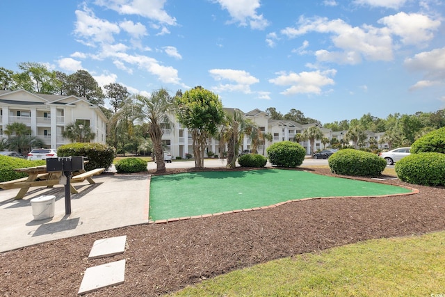 surrounding community with a residential view