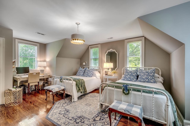 402 E Broad St, Hemingway, SC 29554 - bedroom featuring wood finished floors and lofted ceiling