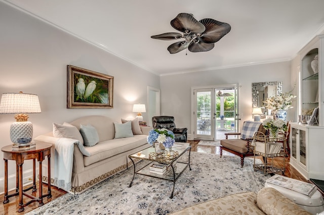 402 E Broad St, Hemingway, SC 29554 - living area with ceiling fan, crown molding, wood finished floors, and baseboards
