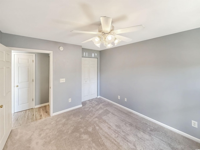 1041 Blue Stem Dr Unit 37A, Pawleys Island, SC 29585 - unfurnished bedroom with carpet floors, baseboards, a closet, and ceiling fan