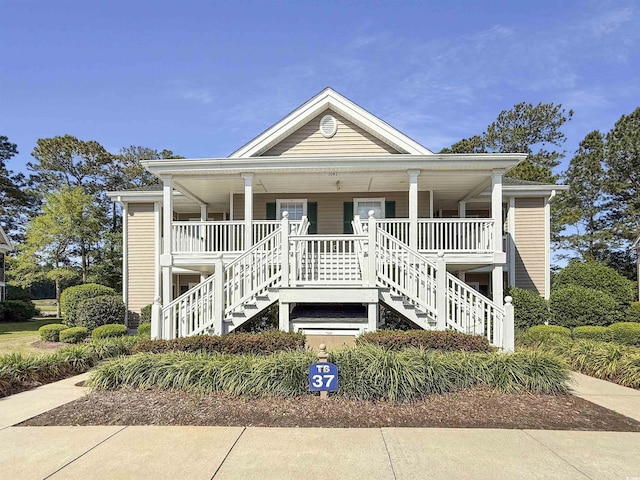 1041 Blue Stem Dr Unit 37A, Pawleys Island, SC 29585 - coastal home with stairway and covered porch