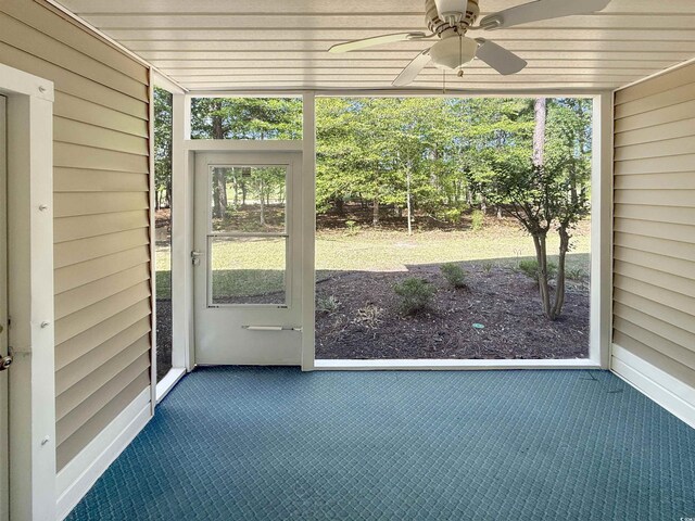 1041 Blue Stem Dr Unit 37A, Pawleys Island, SC 29585 - unfurnished sunroom featuring ceiling fan and healthy amount of natural light