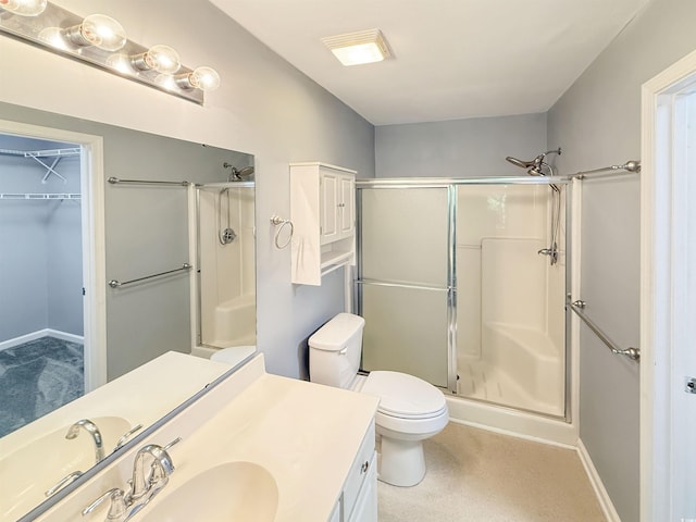1041 Blue Stem Dr Unit 37A, Pawleys Island, SC 29585 - bathroom featuring a stall shower, vanity, toilet, and baseboards