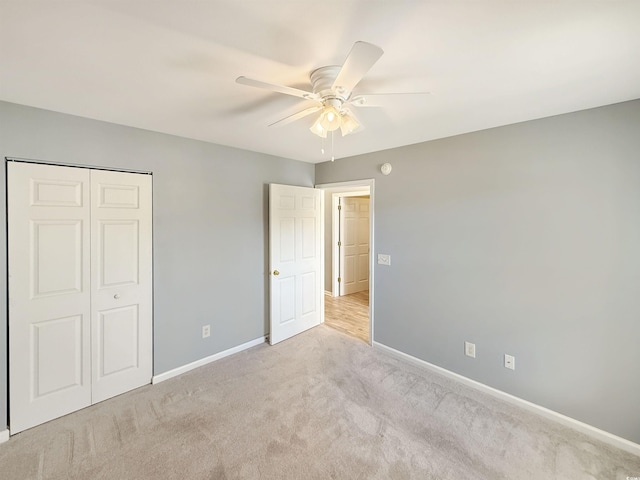 1041 Blue Stem Dr Unit 37A, Pawleys Island, SC 29585 - unfurnished bedroom with carpet, a closet, and a ceiling fan