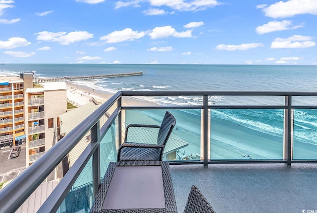 107 S Ocean Blvd Unit 1001, Myrtle Beach, SC 29577 - balcony featuring a water view and a beach view