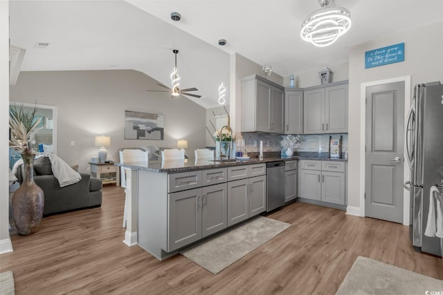 804 Twickenham Loop, Longs, SC 29568 - kitchen with ceiling fan, a peninsula, open floor plan, stainless steel appliances, and gray cabinets