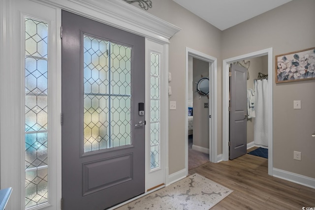 804 Twickenham Loop, Longs, SC 29568 - foyer entrance with baseboards and wood finished floors