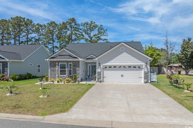 804 Twickenham Loop, Longs, SC 29568 - view of front of house featuring concrete driveway, an attached garage, a front lawn, and stone siding